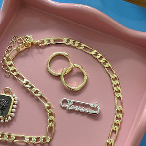 wavy hoops gold