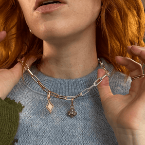 pixelated spinning diamond charm