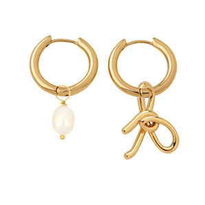 The bow earring stack